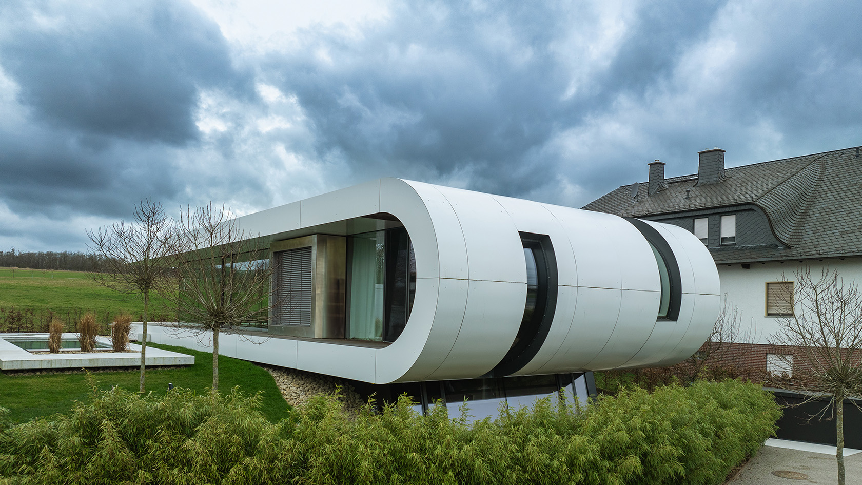 Curved House in Hüttenberg entworfen von Gronych+Dollega Architekten ist am Tag der Architektur 2024 zu besichtigen